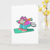 スキージャンプする猫（スキーとスキーゴーグル付き） カード (黄色い花)