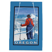 スキーヤーの敬服の念に満ちたヴィンテージ旅行ポスター ミディアムペーパーバッグ (裏面)