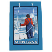 スキーヤーのAdmiringMontanaVintage旅行ポスター ミディアムペーパーバッグ (正面)