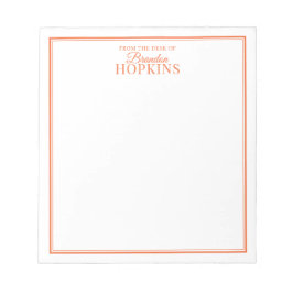 スクリプシンプルトモダン・オレンジの机からの ノートパッド