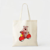 スクーターとのバイクもしくは自転車に乗る人としての豚 トートバッグ (正面)