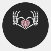 スケルトンハンドハート面白いハロウィーン女性男性 ラウンドシール (正面)