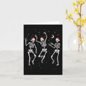 スケルトン踊りとクリスマス帽子 – おもしろいクリスマス カード (黄色い花)
