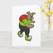 スケーターとしてインラインスケートとバックパックを背負った犬 カード (黄色い花)