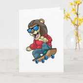 スケーターのライオンとスケートボード カード (黄色い花)