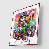 スケートボードでパーティーを飲む準備ができているカエル スクエア壁時計 (傾斜)