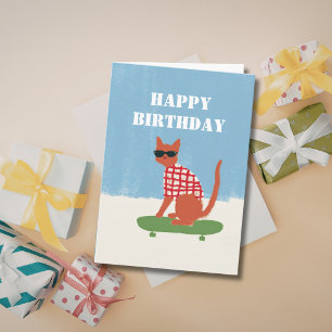 スケートボードに乗ったユーモアあふれるユンケルな猫の誕生日カード カード