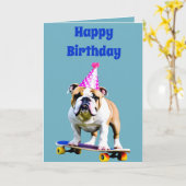 スケートボードに誕生日帽をかぶったブルドッグ カード (黄色い花)