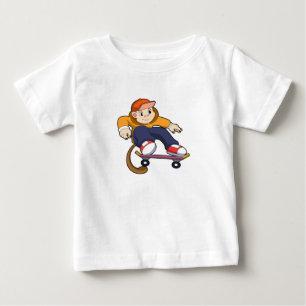 スケートボードを使ったスケーターとしてのサル ベビーTシャツ