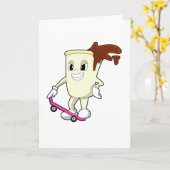 スケートボードを持つスケーターとしてのコーヒー カード (黄色い花)