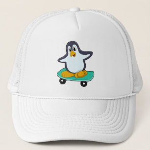 スケートボード上のスケーターとしてのペンギン キャップ