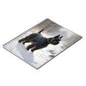 スコットランドのテリアが雪のクリスマスを過ごした ノートブック (左側)