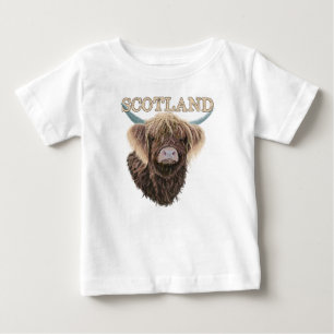 スコットランドのハイランド牛のスローガン ベビーTシャツ