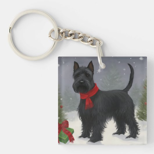 スコティッシュ・テリアの犬と雪のクリスマス キーホルダー (正面)