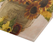 スズバスケットにオレンジ色のひまわり カッティングボード (角)