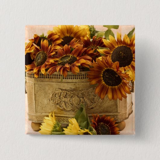 スズバスケットにオレンジ色のひまわり 缶バッジ (正面)
