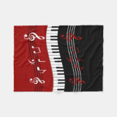 スタイリッシュで赤い白黒のピアノ鍵およびノート フリースブランケット (正面(横))