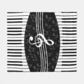 スタイリッシュな音符のクレフ、音符記号およびピアノ鍵 フリースブランケット (正面(横))