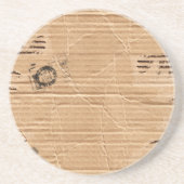 スタンプおよび汚れが付いているブラウンの古い傷つけられたボール紙 コースター (正面)