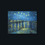 スターリーナイト・オーバー・ザ・リバー・ローネ(ヴァン・ゴッホ) キャンバスプリント<br><div class="desc">このデザインは絵画、オランダ後印象派の画家ヴィンセント・ファン・ゴッホ(1853-1890)の作品を取り上げ、西洋美術の歴史の中で最も影響力のある姿の一つと広く認められている。それは風景絵画で、ローヌ川の岸から夜にアーレスの都市を示している。ゴッホは彼のシーンに選絵画択した彼は、ラーンの輝く青い水の向こうにアーレスのガス照明の反射をキャプチャすることを許可した。男と女絵画は、おそらく2人の恋人で、川の土手を歩いている。このオリジナルのアートワークは1888年に生産され、現在はフランスのパリのオルセー美術館に収蔵されている。</div>