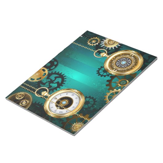 スチームパンクジュエリーウォッチを緑の背景 ノートパッド (アングル)