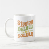 ステイングデルルザソルルグルーヴィースタイル コーヒーマグカップ (左)