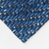 ステッチされたデニム:ジーンズのテクスチャをクローズアップ。 フリースブランケット (角)