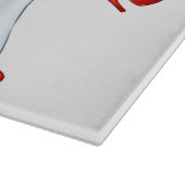 ストッキングを抜いているユニフォームのブロンドのナース カッティングボード (角)