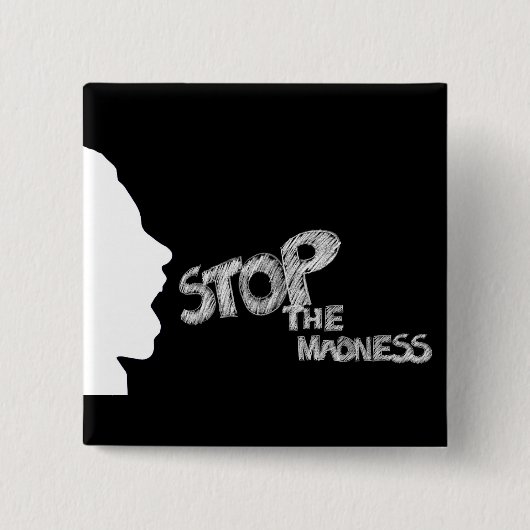 ストップ狂気 缶バッジ (正面)