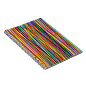 ストリペスコルで作られた明るい背景とカラフル ノートブック (右側)