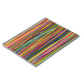 ストリペスコルで作られた明るい背景とカラフル ノートブック (左側)