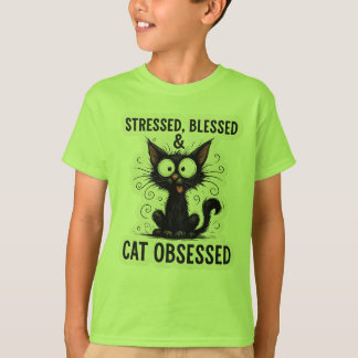 ストレスがたまってはいますが神に祝福され、そして猫に夢中な面白い黒猫デザイン Tシャツ