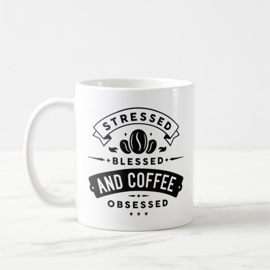 ストレス賛美とコーヒーに悩まされる コーヒーマグカップ (左)