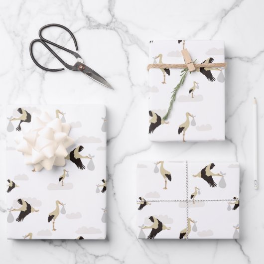 ストーク生まれたばかりの男の赤ちゃんガールパターン ラッピングペーパーシート (正面)