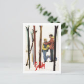 スノーバレー、アイダホ州 - カップルが雪に立てるスキーのポスター ポストカード (スタンド正面)