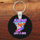 スノーボーダーが女の子のスノーボードのように輝いた キーホルダー (正面)