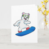 スノーボーダーとして雪山を滑るホッキョクグマ カード (黄色い花)
