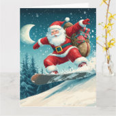 スノーボードでクリスマスプレゼントを届けるサンタ カード (黄色い花)