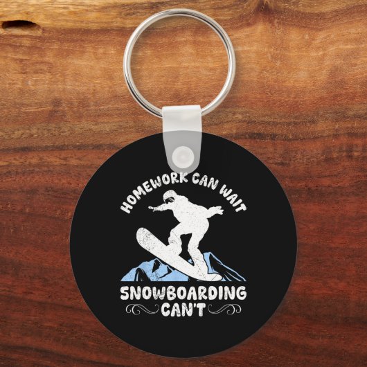 スノーボードの宿題でスノーボーダーの子供を待つ キーホルダー (正面)