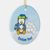 スノーボールを持って座っている小さなペンギン セラミックオーナメント (右)