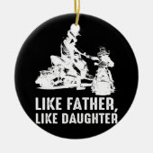 スノーモービルのような父のような娘のバイクもしくは自転車に乗る人父 セラミックオーナメント (正面)