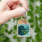 スパイラルターコイズコンチシェル キーホルダー (手)