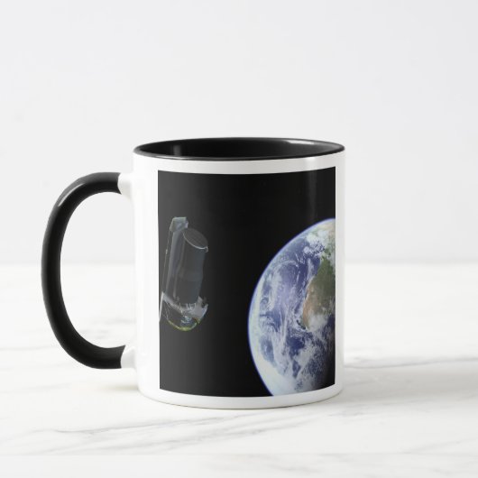 スピッツァーは打ち上げ直後に地球を出発 マグカップ (左)