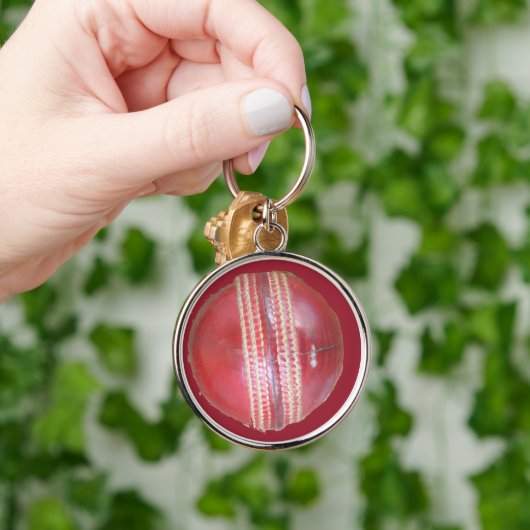 スピンマスターの球：おもしろい離れスクリケットボール キーホルダー (手)