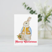 スプルースのぬか入りのバスケットを持つ可愛いクリスマスヘア ポストカード (スタンド正面)