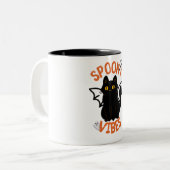 スプーキーな雰囲気の猫の顔 ハロウィンマグ ツートーンマグカップ (正面左)