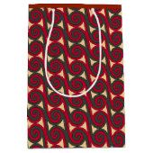 スプーンでつぐことは赤、緑および金ゴールドで渦巻きます ミディアムペーパーバッグ (正面)