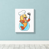 スプーンで調理師したグラスの魚 キャンバスプリント (インサイチュ (ウッドフロア))