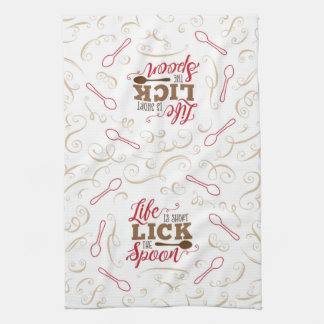 スプーンのキッチンタオルをなめる キッチンタオル