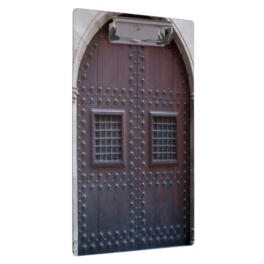 スペインの強い木製の茶色の扉 クリップボード (右)